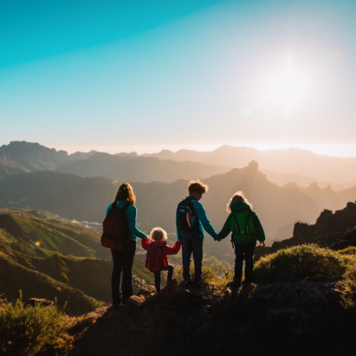 group of people holding hands outside