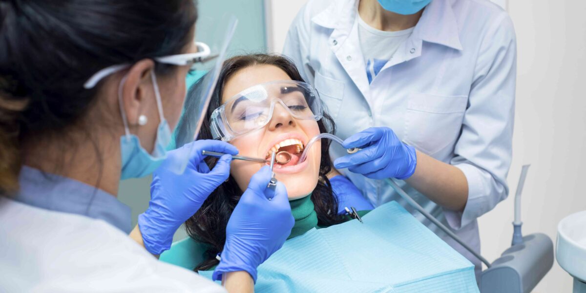 Woman getting dental treatment