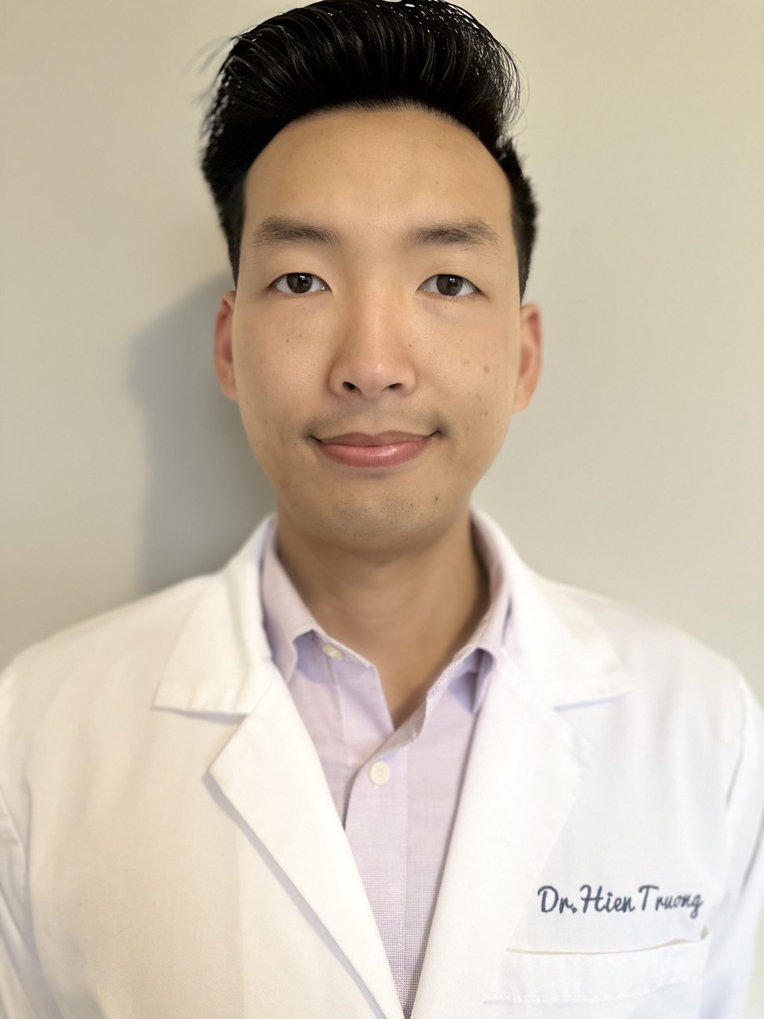A head shot of Hien Truong, a dentist in Springfield Massachusetts